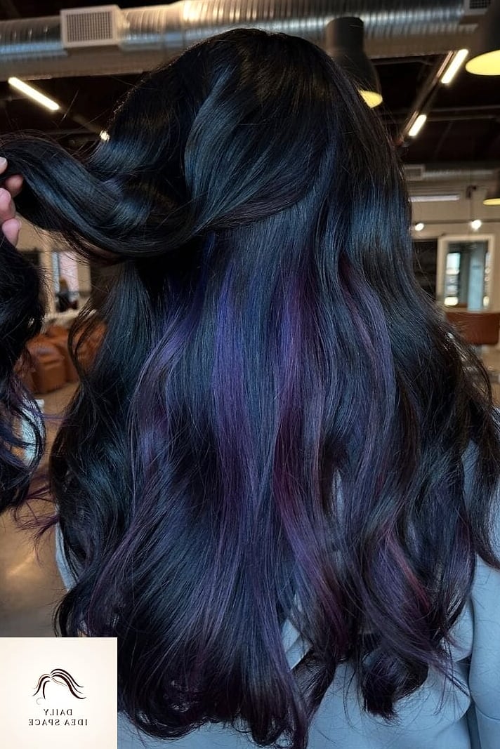 20 Peekaboo Hair Color Ideas That Are Breathtakingly Beautiful 13 Black Hair with Deep Purple Peekaboo