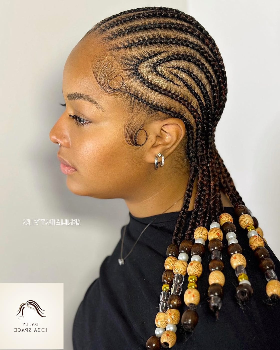 27 Cornrows Braids For Black Women Ideas Every Woman Needs to See 10 Cornrows with a Curved Middle Part