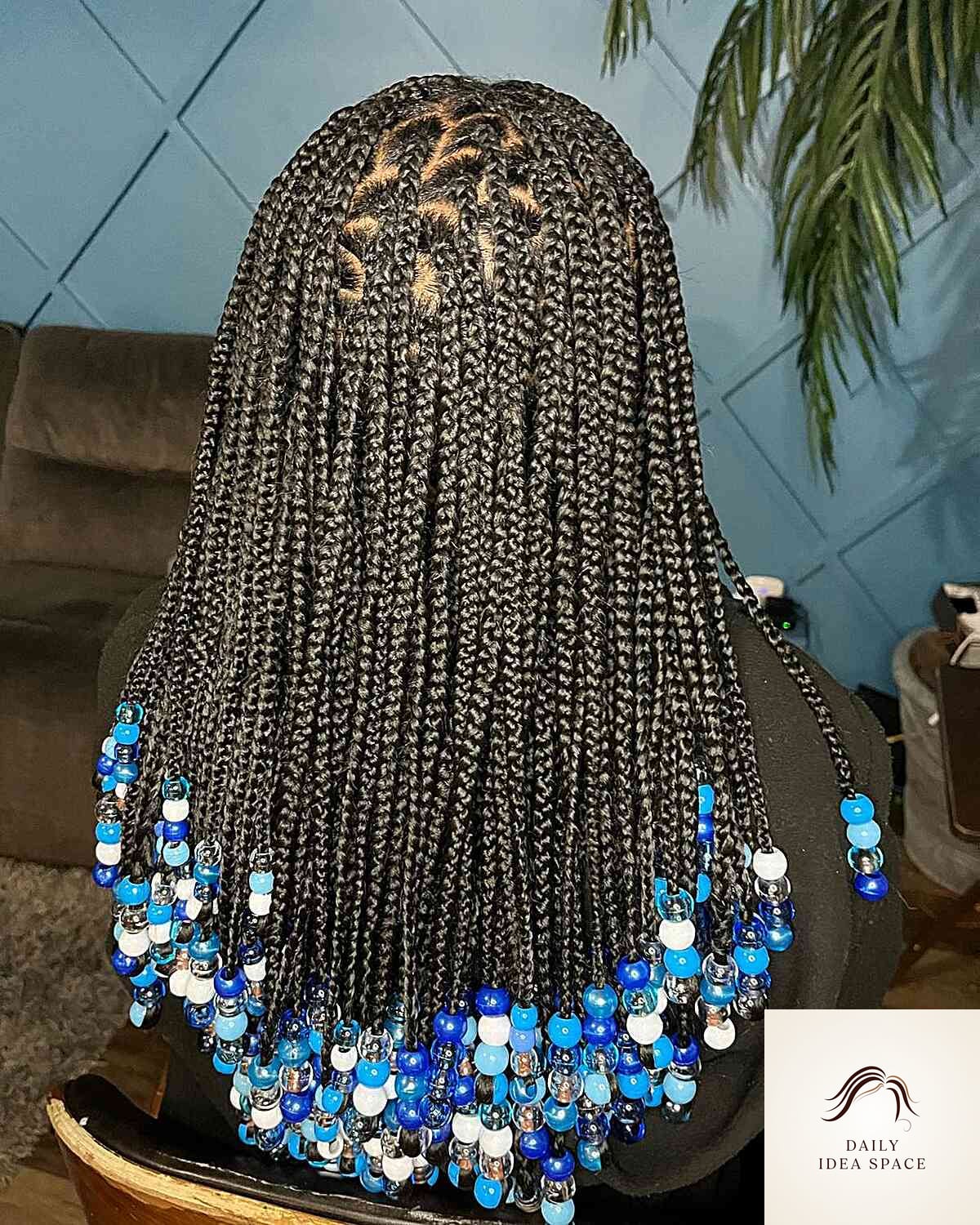 20 Braids Ideas That Are Breathtakingly Beautiful 15 Thick Knotless Braids with Blue Beads