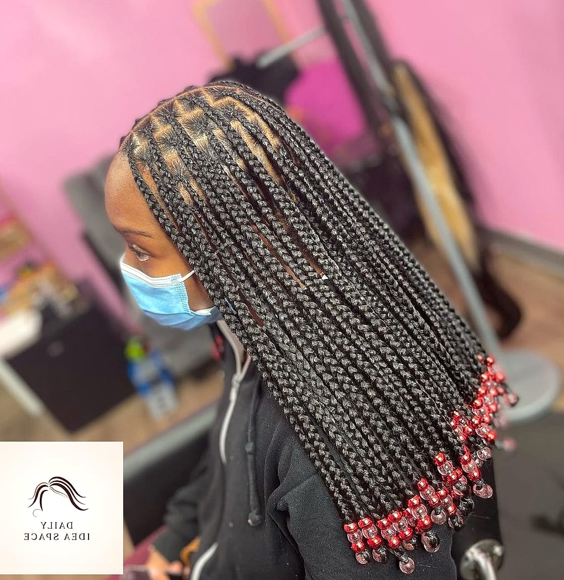 Vibrant Long Black Box Braids with Colorful Beads